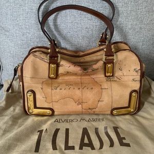 Geo print and leather handbag.